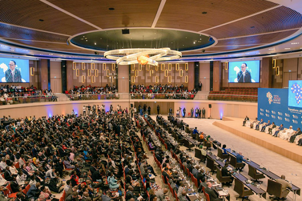 Delegates meeting at an education conference